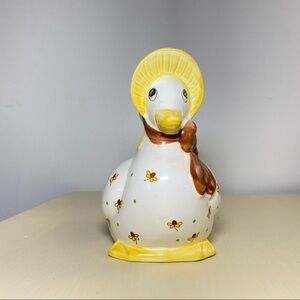 Vintage mother goose planter hat bow brown yellow